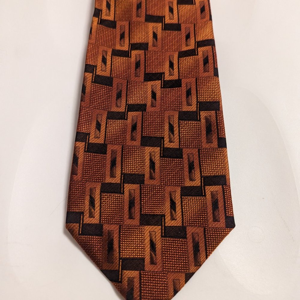 Orange tie with black designs by Emilio Ponti, 100% silk